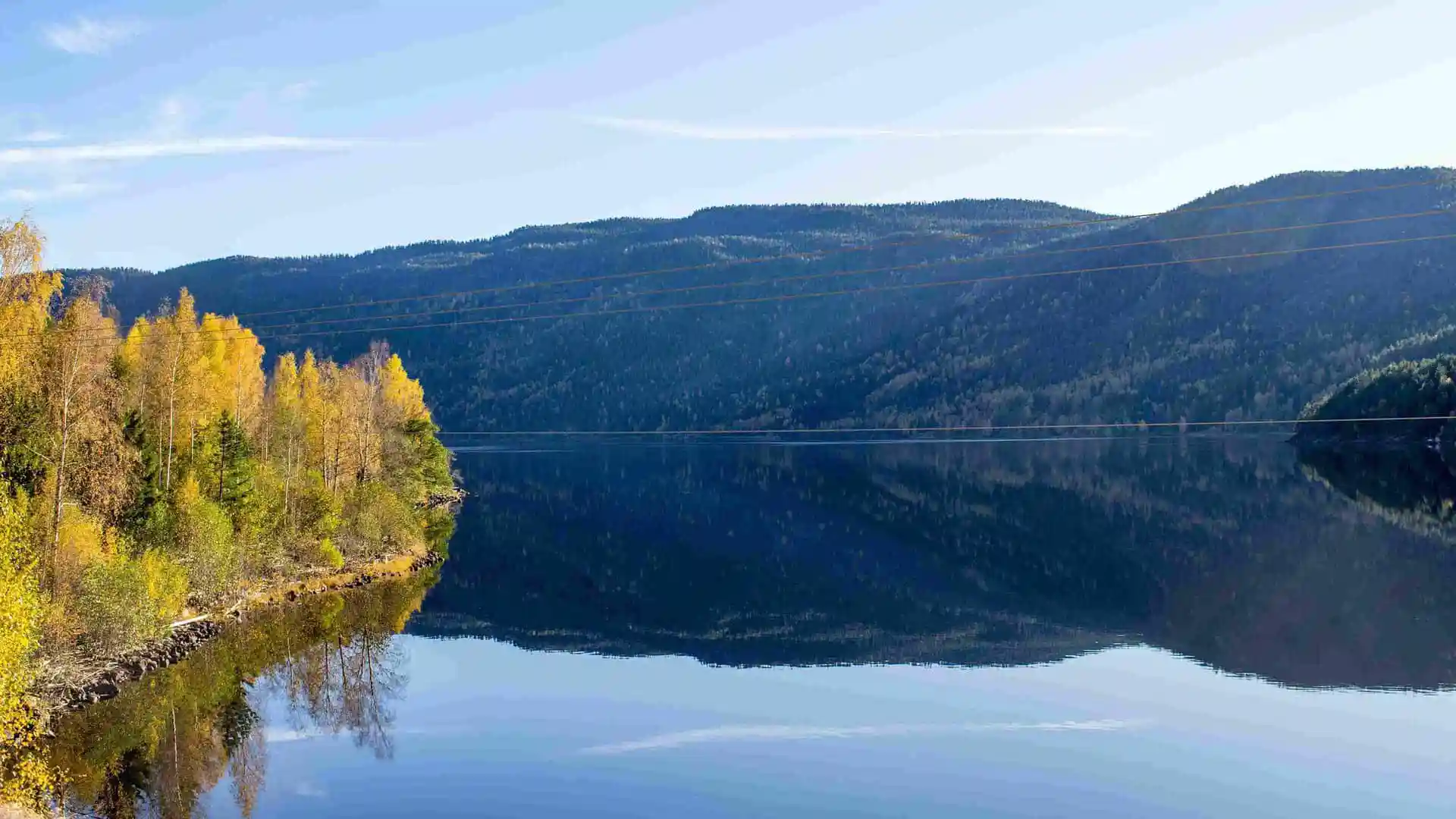 Camping og hytter nær Seljord hos Sanda Camping i Telemark – rolige omgivelser ved Bøelva med teltplasser, bobilområder og koselige hytter. Kort vei til Seljordsvatnet og turmuligheter.